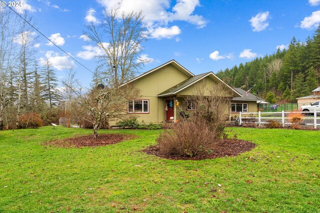 view of front of property with a front lawn