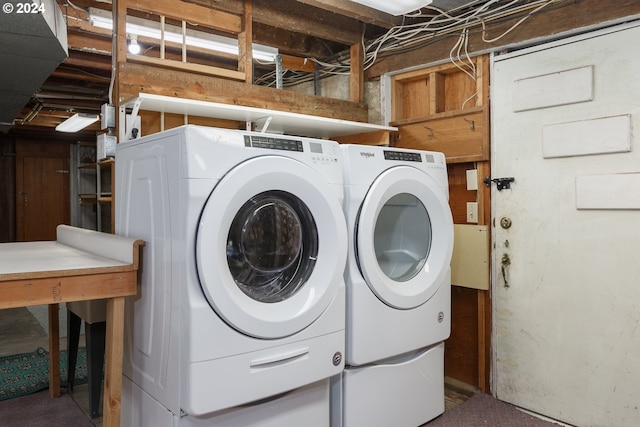 laundry room with washer and dryer