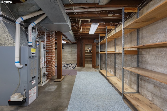 basement featuring gas water heater