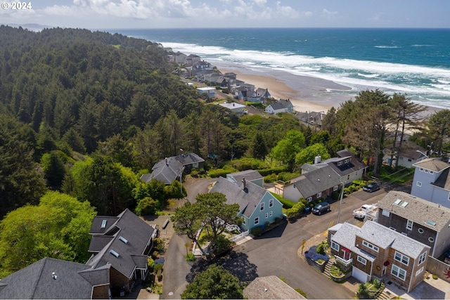 bird's eye view with a view of the beach and a water view