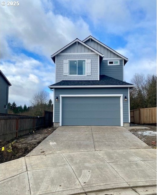 view of front of property with a garage