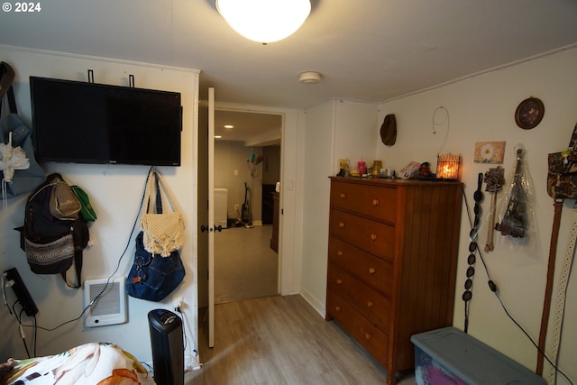 bedroom featuring light wood-type flooring