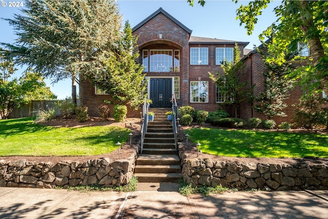 view of front facade featuring a front yard