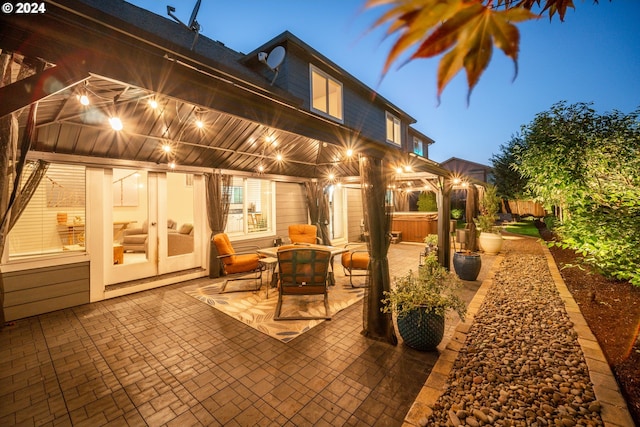 patio terrace at dusk with a gazebo