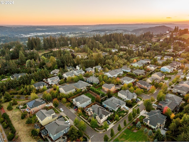 view of aerial view at dusk