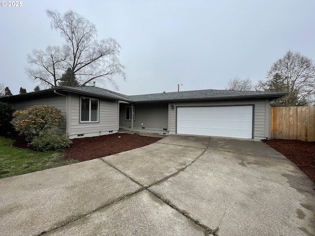 single story home featuring a garage