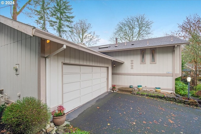 exterior space with a garage