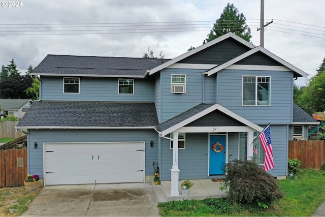 view of front of property featuring a garage