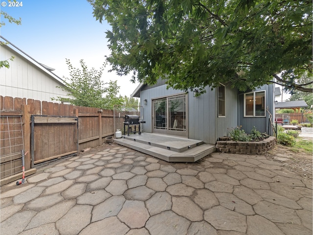 view of patio featuring a deck and grilling area