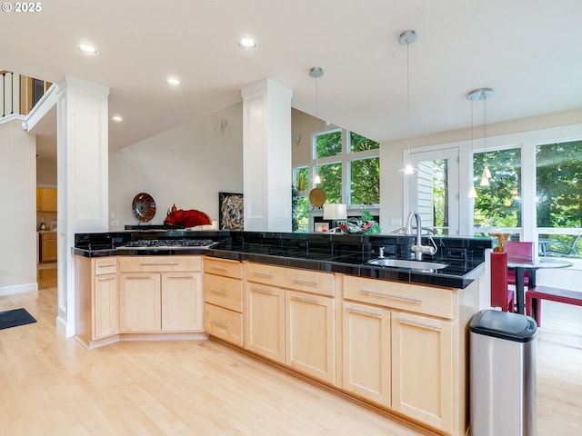 4374 M Loop, Washougal, WA 98671 - kitchen featuring light wood-style floors, stainless steel gas cooktop, light brown cabinetry, dark countertops, and recessed lighting