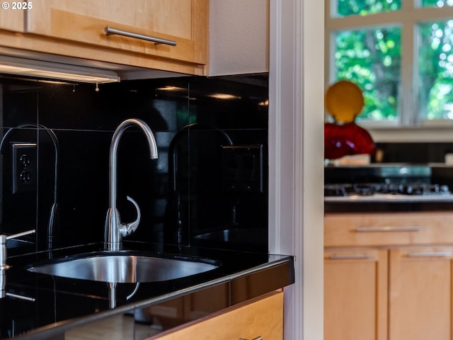 4374 M Loop, Washougal, WA 98671 - kitchen with cooktop, dark countertops, and tasteful backsplash