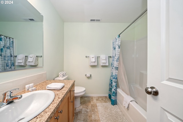 full bathroom with vanity, tasteful backsplash, toilet, and shower / bathtub combination with curtain