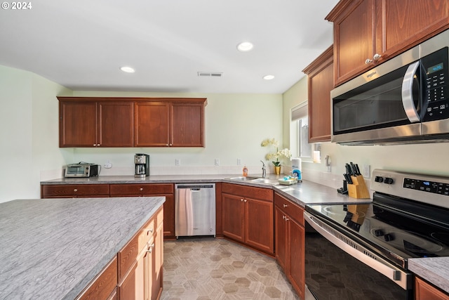 kitchen with sink and stainless steel appliances