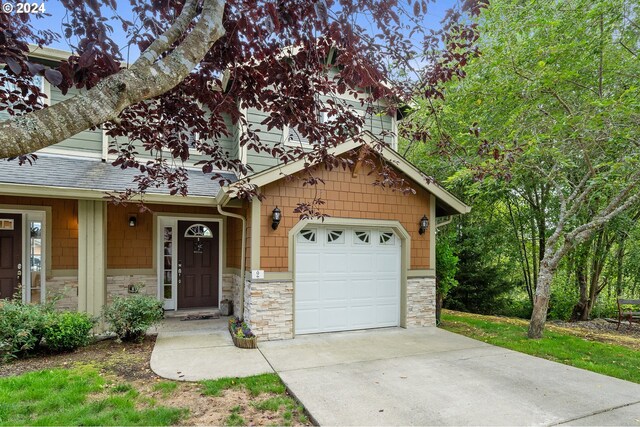 view of front of property featuring a garage