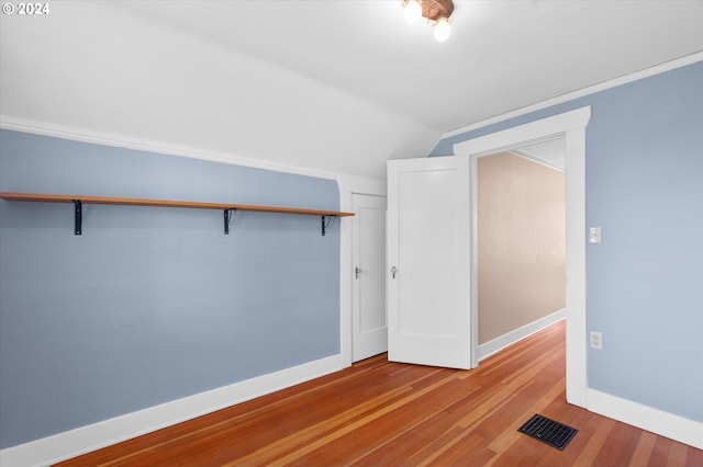 unfurnished room featuring wood-type flooring