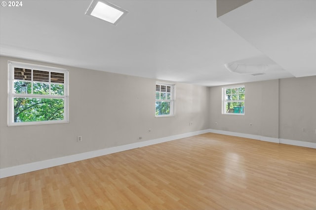 unfurnished room featuring light wood-type flooring