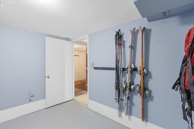 interior space with a textured ceiling