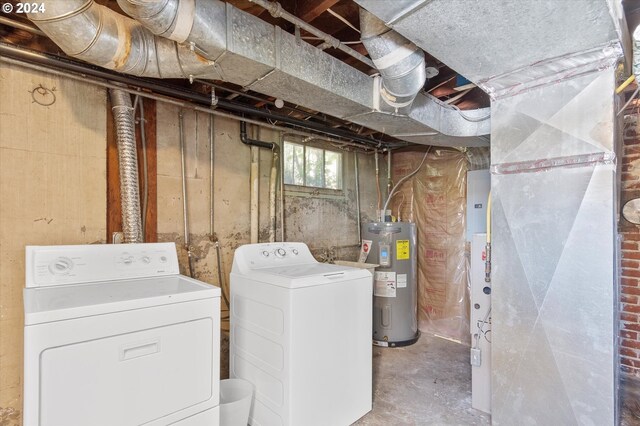 interior space featuring separate washer and dryer and water heater