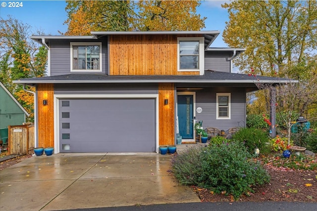 view of front of property with a garage