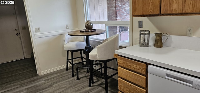 dining room featuring dark wood-style flooring