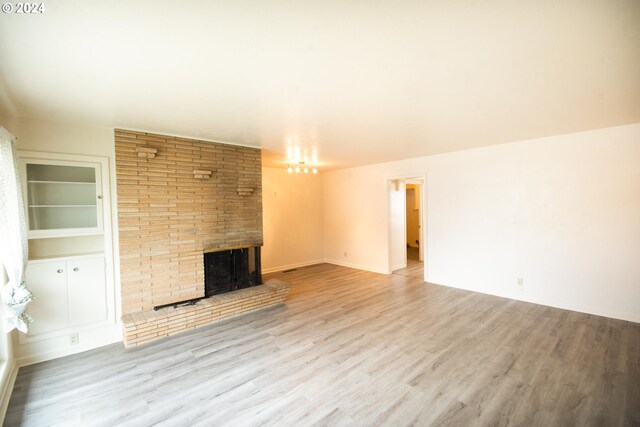 empty room featuring hardwood / wood-style floors and a wealth of natural light