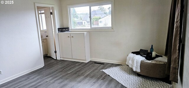 view of front of property with central air condition unit and a garage