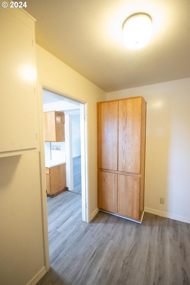 empty room featuring dark hardwood / wood-style flooring