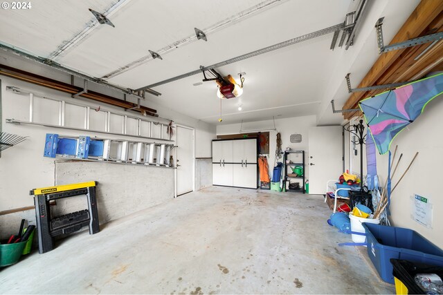 garage featuring a garage door opener