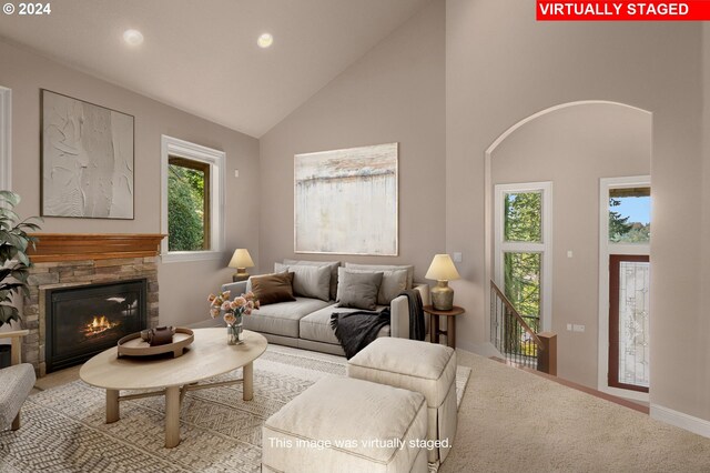 living room featuring hardwood / wood-style flooring, a chandelier, and ornamental molding