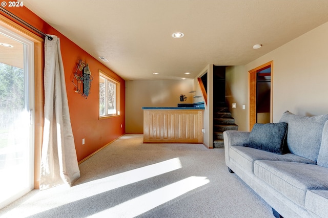 living room with light colored carpet