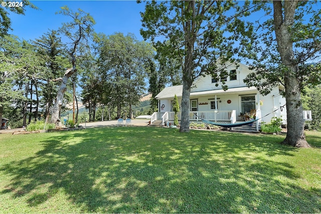 view of yard with a porch