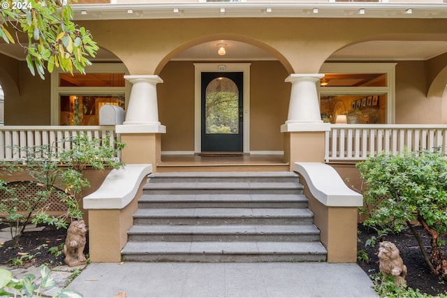 property entrance with a porch