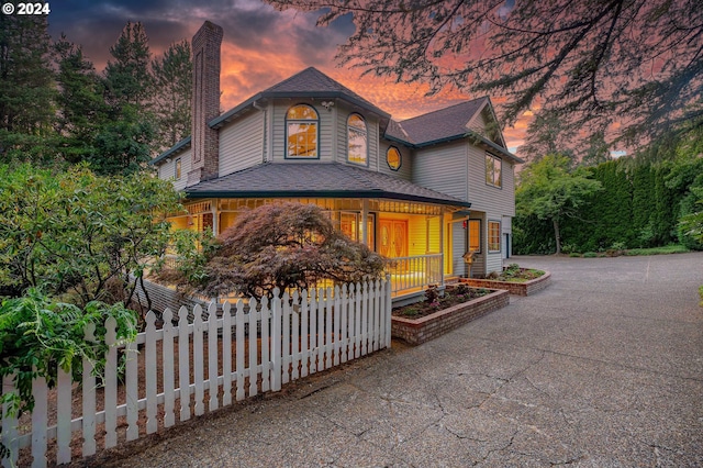 victorian home featuring covered porch