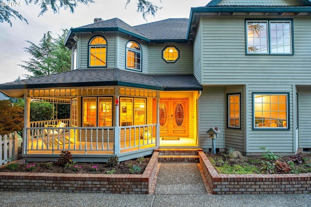 view of front of property featuring covered porch