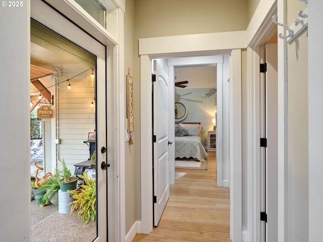 hallway featuring light hardwood / wood-style flooring