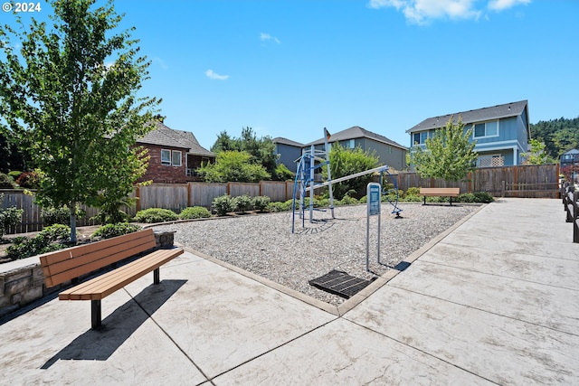 view of jungle gym featuring a patio