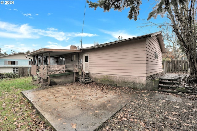 back of house featuring a patio