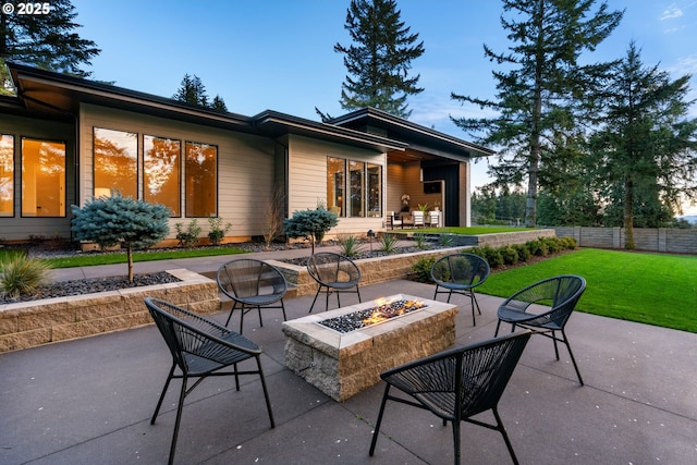 view of patio featuring an outdoor fire pit