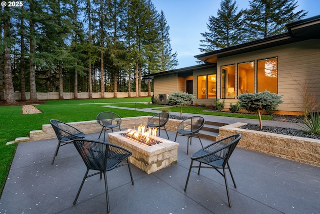 view of patio with an outdoor fire pit