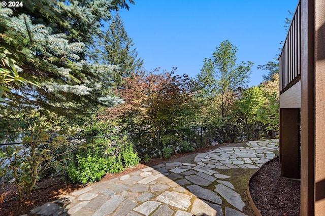 view of patio featuring fence