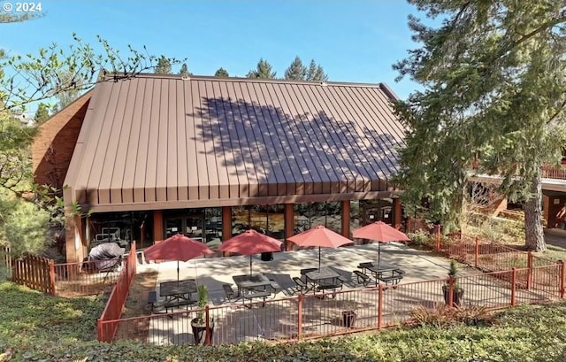 view of property's community featuring a patio area