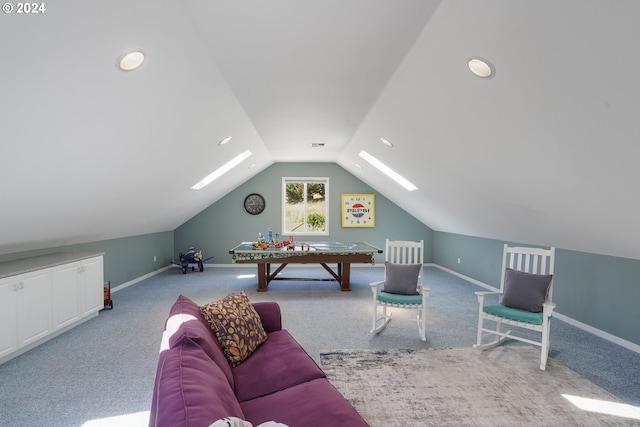 rec room featuring light colored carpet and lofted ceiling with skylight