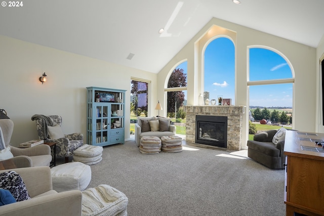 carpeted living room featuring high vaulted ceiling