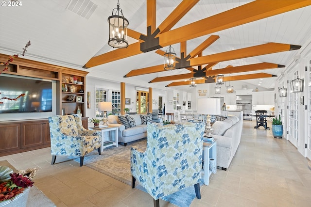 living room featuring high vaulted ceiling, a chandelier, and beam ceiling