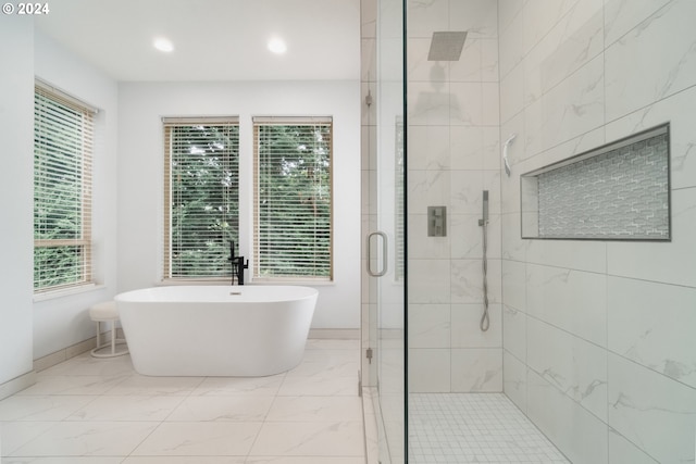 bathroom with independent shower and bath