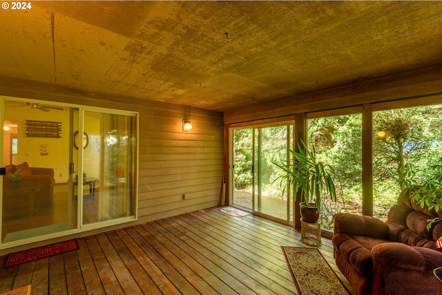 sunroom / solarium with wood ceiling