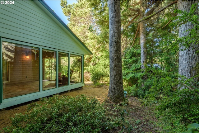 view of yard featuring a sunroom