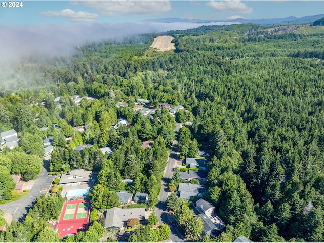 aerial view featuring a forest view