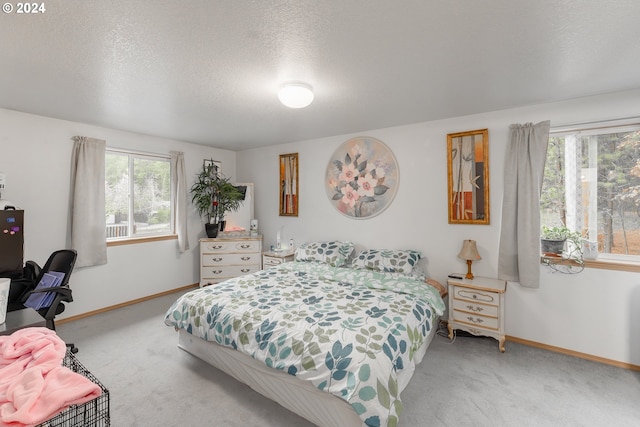 681 Hamlin Dr, Canyonville, OR 97417 - carpeted bedroom featuring baseboards and a textured ceiling