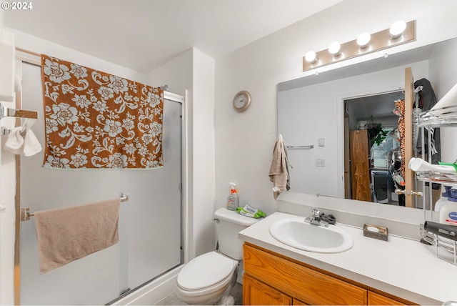 681 Hamlin Dr, Canyonville, OR 97417 - bathroom featuring a shower stall, vanity, and toilet